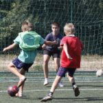 Wakacje z Futbolem 2013, mecz Orlik 27 Kielce - FC Nitro (podstawówki) / Kamil Król / Radio Kielce