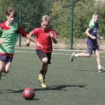 Wakacje z Futbolem 2013, mecz Orlik 27 Kielce - FC Nitro (podstawówki) / Kamil Król / Radio Kielce