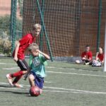 Wakacje z Futbolem 2013, mecz Orlik 27 Kielce - FC Nitro (podstawówki) / Kamil Król / Radio Kielce