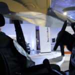 Specjalne stoisko poświęcone naprawom powypadkowym podczas targów Moto Show w Poznaniu / Robert Felczak / Radio Kielce