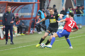 22.3.2015 Gliwice. Fragment meczu Piast Gliwice - Korona Kielce. Paweł Golański / Wojciech Habdas / Radio Kielce