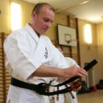 Uroczystość wręczenia karatekom z Kieleckiego Klubu Karate Kyokushin certyfikatów i pasów na I i II stopień dan / Kamil Król / Radio Kielce