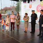 13.7.2015 Kielce. Roztańczony korowód uczestników Festiwalu Harcerskiego przeszedł ulicami Kielc. Prezydent wręczył harcerzom klucze do miasta. / Wojciech Habdas / Radio Kielce