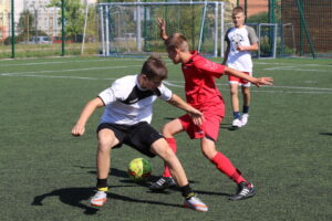 19.08.2015. Wakacje z Futbolem 2015. Orlik 27 Kielce I - Red and Yellow I (finał gimnazjalistów) / Kamil Król / Radio Kielce