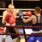 09.12.2016 Chęciny. IV Międzynarodowy Memoriał Bokserski im. Leszka Drogosza. Walka Adrian Kowal KKB Rush (czerwony) - Thomas Casey Irlandia. / Jarosław Kubalski / Radio Kielce