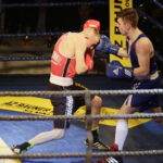 09.12.2016 Chęciny. IV Międzynarodowy Memoriał Bokserski im. Leszka Drogosza. Walka Adrian Kowal KKB Rush (czerwony) - Thomas Casey Irlandia. / Jarosław Kubalski / Radio Kielce