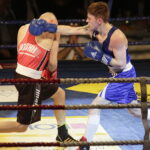 09.12.2016 Chęciny. IV Międzynarodowy Memoriał Bokserski im. Leszka Drogosza. Walka Adrian Kowal KKB Rush (czerwony) - Thomas Casey Irlandia. / Jarosław Kubalski / Radio Kielce