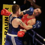 09.12.2016 Chęciny. IV Międzynarodowy Memoriał Bokserski im. Leszka Drogosza. Walka Adrian Kowal KKB Rush (czerwony) - Thomas Casey Irlandia. / Jarosław Kubalski / Radio Kielce