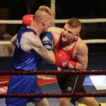 09.12.2016 Chęciny. IV Międzynarodowy Memoriał Bokserski im. Leszka Drogosza. Walka Tomasz Karyś KKB Rush (czerwony) - Jason Scully Irlandia. / Jarosław Kubalski / Radio Kielce