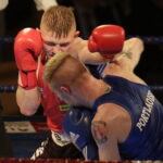 09.12.2016 Chęciny. IV Międzynarodowy Memoriał Bokserski im. Leszka Drogosza. Walka Tomasz Karyś KKB Rush (czerwony) - Jason Scully Irlandia. / Jarosław Kubalski / Radio Kielce