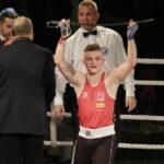 09.12.2016 Chęciny. IV Międzynarodowy Memoriał Bokserski im. Leszka Drogosza. Walka Tomasz Karyś KKB Rush (czerwony) - Jason Scully Irlandia. / Jarosław Kubalski / Radio Kielce