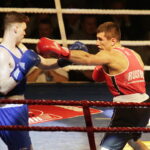 09.12.2016 Chęciny. IV Międzynarodowy Memoriał Bokserski im. Leszka Drogosza. Walka Bartosz Gołębiewski KKB Rush (czerwony) - Michael Nevin Irlandia. / Jarosław Kubalski / Radio Kielce