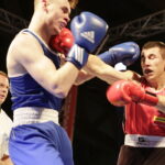 09.12.2016 Chęciny. IV Międzynarodowy Memoriał Bokserski im. Leszka Drogosza. Walka Bartosz Gołębiewski KKB Rush (czerwony) - Michael Nevin Irlandia. / Jarosław Kubalski / Radio Kielce