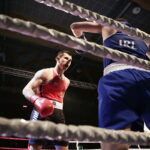 09.12.2016 Chęciny. IV Międzynarodowy Memoriał Bokserski im. Leszka Drogosza. Walka Bartosz Gołębiewski KKB Rush (czerwony) - Michael Nevin Irlandia. / Jarosław Kubalski / Radio Kielce