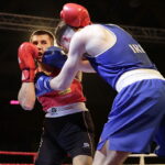 09.12.2016 Chęciny. IV Międzynarodowy Memoriał Bokserski im. Leszka Drogosza. Walka Bartosz Gołębiewski KKB Rush (czerwony) - Michael Nevin Irlandia. / Jarosław Kubalski / Radio Kielce