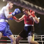 09.12.2016 Chęciny. IV Międzynarodowy Memoriał Bokserski im. Leszka Drogosza. Walka Bartosz Gołębiewski KKB Rush (czerwony) - Michael Nevin Irlandia. / Jarosław Kubalski / Radio Kielce