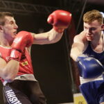 09.12.2016 Chęciny. IV Międzynarodowy Memoriał Bokserski im. Leszka Drogosza. Walka Bartosz Gołębiewski KKB Rush (czerwony) - Michael Nevin Irlandia. / Jarosław Kubalski / Radio Kielce