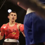 09.12.2016 Chęciny. IV Międzynarodowy Memoriał Bokserski im. Leszka Drogosza. Walka Bartosz Gołębiewski KKB Rush (czerwony) - Michael Nevin Irlandia. / Jarosław Kubalski / Radio Kielce