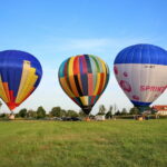 18.08.2017 Pińczów. Fiesta Balonowa. / Marzena Mąkosa - Radio Kielce / Kolorowe balony na terenie Aeroklubu w Pińczowie