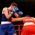 Mecz Polska - Irlandia w Hali "Pod Basztami". Bartosz Gołębiewski i Michael Nevin w walce / Marzena Mąkosa / Radio Kielce