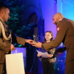 III Festiwal Kolęd i Pastorałek "Żołnierskie kolędowanie" w kościele garnizonowym. Na zdjęciu: mjr Andrzej Szostak, płk. Paweł Chabielski oraz Marysia Chwastek / Marzena Mąkosa / Radio Kielce