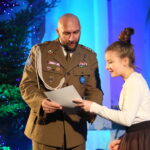 III Festiwal Kolęd i Pastorałek "Żołnierskie kolędowanie" w kościele garnizonowym. Na zdjeciu: płk. Paweł Chabielski i Joanna Orłowicz / Marzena Mąkosa / Radio Kielce