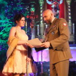 III Festiwal Kolęd i Pastorałek "Żołnierskie kolędowanie" w kościele garnizonowym. Anna Szurek i płk. Paweł Chabielski / Marzena Mąkosa / Radio Kielce