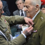 Awans i odznaczenie dla Zbigniewa Blinowskiego podczas sesji Rady Miejskiej w Ożarowie / Michał Ślusarz