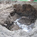 Prace archeologiczne związane z poszukiwaniem ofiar komunistycznego terroru na cmentarzu Piaski w Kielcach / Leszek Bukowski / Kielecka delegatura IPN