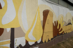 Mural na ścianie składu opałowego przy ulicy Partyzantów / Kamil Włosowicz / Radio Kielce