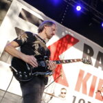Koncertowe Lato z Radiem Kielce. Koncert zespołu ANKH w Parku Miejskim w Kielcach. Na zdjęciu: Michał Pastuszka - gitara / Marzena Mąkosa / Radio Kielce