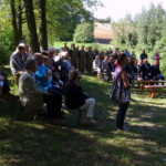 Odsłonięto obelisku poświęconego Polskiej Organizacji Wojskowej i mieszkańcom miejscowości, którzy sto lat temu stawili czynny opór żandarmerii austriackiej, dokonującej rekwizycji żywności / Emilia Sitarska / Radio Kielce