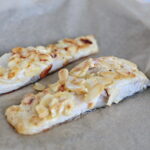 Michał Jurecki - piłkarz ręczny PGE VIVE Kielce w Zespole Szkół Przemysłu Spożywczego w Kielcach. Karp w płatkach migdałów / Marzena Mąkosa / Radio Kielce