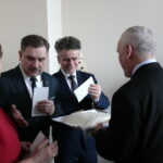 Regionalne spotkanie opłatkowe Zarządu Regionu Świętokrzyskiego NSZZ "Solidarność". Na zdjęciu (od lewej): Danuta Papaj - pełnomocnik prezydenta Kielc, Piotr Duda - przewodniczący centrali związku "Solidarność" i Krzysztof Słoń - senator RP / Marzena Mąkosa / Radio Kielce