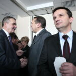 Regionalne spotkanie opłatkowe Zarządu Regionu Świętokrzyskiego NSZZ "Solidarność". Po lewej: Wojciech Lubawski - były prezydent Kielc i Mirosław Gębski - starosta kielecki  / Marzena Mąkosa / Radio Kielce