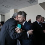 Regionalne spotkanie opłatkowe Zarządu Regionu Świętokrzyskiego NSZZ "Solidarność". Na zdjęciu: Przemysław Predygier - prezes TVP3 Kielce i Krzysztof Słoń - senator RP / Marzena Mąkosa / Radio Kielce