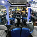 Kielce. 25. Międzynarodowe Targi Techniki Rolniczej AGROTECH. Ciągnik New Holland napędzany metanem / Marzena Mąkosa / Radio Kielce