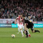 Mecz Cracovia Kraków - Korona Kielce. Wato Arweładze / Krzysztof Bujnowicz / Radio Kielce