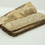 Najstarsza księga metrykalna z Katedry Kieleckiej przed pełną konserwacją / Archiwum Diecezjalne