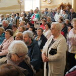 Buskie Dni Otwarte dla Turystyki 2019. Zwiedzanie kościoła świętego Brata Alberta w Busku-Zdroju oraz dzielenie się podpłomykami / Marta Gajda / Radio Kielce