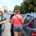 Trójka dzieci i pies zamknięte w zaparkowanym samochodzie przy ulicy Radiowej / Piotr Kwaśniewski / Radio Kielce