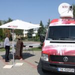 Ruda Maleniecka. Letni Raport Dnia. Leszek Kuca - wójt gminy Ruda Maleniecka i Ewa Okońska - Radio Kielce / Krzysztof Bujnowicz / Radio Kielce