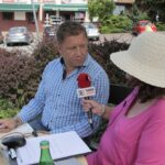 Łopuszno. Letni Raport Dnia. Mariusz Łuszczyński - prezes Gminnego Ośrodka Sportowo-Wypoczynkowego w Łopusznie i Ewa Okońska - Radio Kielce / Krzysztof Bujnowicz / Radio Kielce
