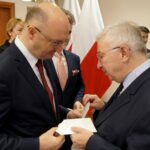 16.12.2019. Kielce. Wigilia u wojewody świętokrzyskiego. Na zdjęciu (od lewej): Piotr Wawrzyk - wiceminister spraw zagranicznych i Krzysztof Lipiec - lider świętokrzyskiego PiS / Piotr Kwaśniewski / Radio Kielce