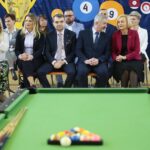 04.12.2019 Kielce. Otwarcie ośrodka szkolenia bilardowego w SP nr 1 na Bocianku. Na zdjęciu (w pierwszym rzędzie, od lewej): Anna Kibortt - kielecka radna, Joanna Winiarska - kielecka radna, Marcin Różycki - wiceprezydent Kielc, Kazimierz Mądzik - świętokrzyski kurator oświaty i Renata Janik - wicemarszałek województwa / Wiktor Taszłow / Radio Kielce