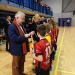 12.01.2020 Starachowice. Ogólnopolski Halowy Turniej Piłki Nożnej. Rozgrywki o puchar posła Krzysztofa Lipca. Medale wręczają: poseł Krzysztof Lipiec i Agnieszka Kuś - radna powiatu starachowickiego / Anna Głąb / Radio Kielce