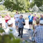 26.07.2020. Kielce. Spacer Historyczny „Dzieje SHL-ki”. Na zdjęciu (w środku): Krzysztof Myśliński - p.o. dyrektora Muzeum Historii Kielc / Wiktor Taszłow / Radio Kielce