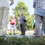 26.07.2020. Kielce. Spacer Historyczny „Dzieje SHL-ki”. Na zdjęciu (w środku): Krzysztof Myśliński - p.o. dyrektora Muzeum Historii Kielc / Wiktor Taszłow / Radio Kielce