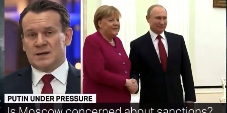 TRT World. Na zdjęciu (od lewej): Dominik Tarczyński - europoseł PiS, Angela Merkel - kanclerz federalny Niemiec i Władimir Putin - prezydent Rosji / TRT World