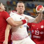 15.01.2021 Egipt. Mistrzostwa świata w piłce ręcznej. Mecz Tunezja - Polska. Na zdjęciu (od lewej): Jaballah Jihed i Rafał Przybylski / Khaled Elfiqi / POOL / PAP/EPA